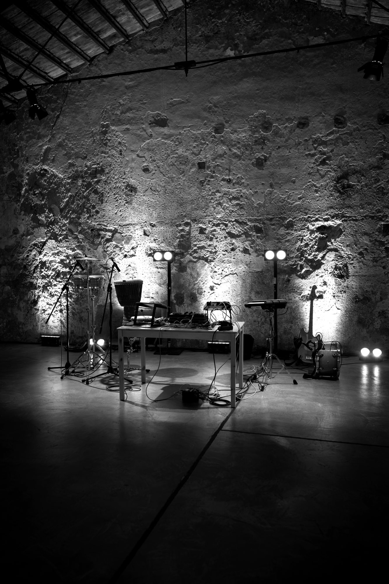 A historic distillery lit for an evening